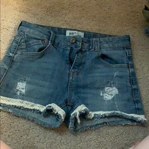 Distressed denim shorts